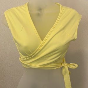 Cropped Yellow Short Sleeve Medium runs Small.